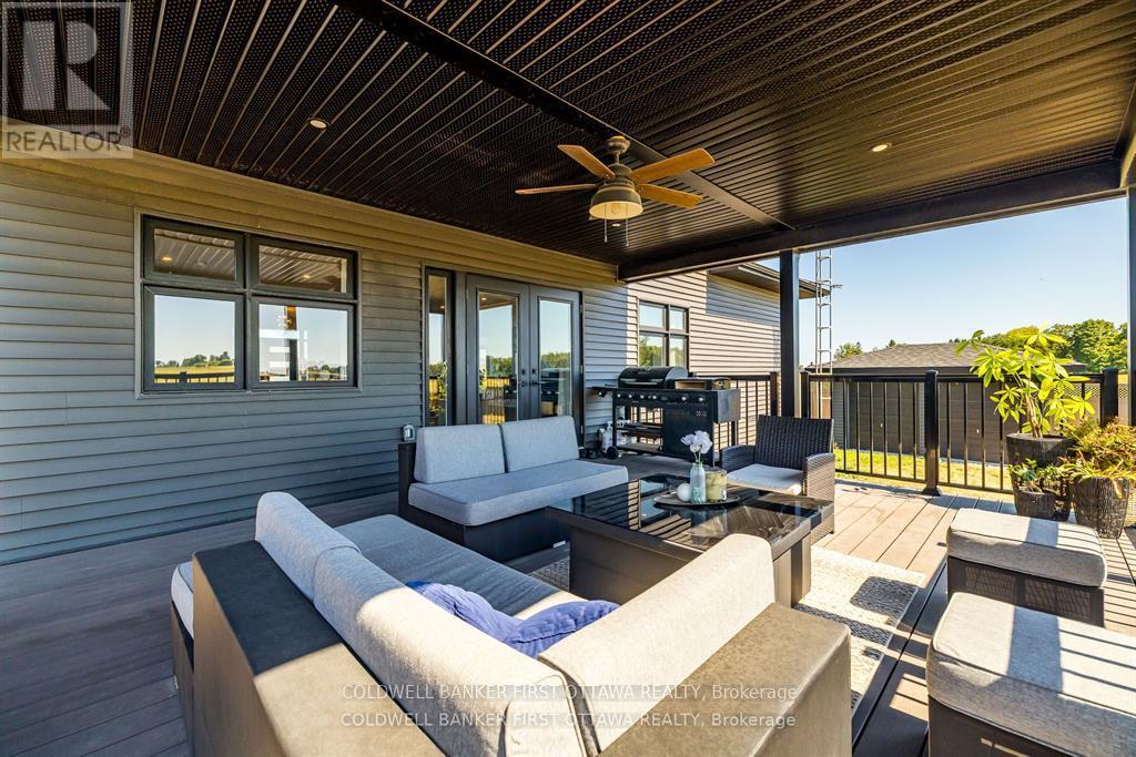 Covered back porch with BBQ