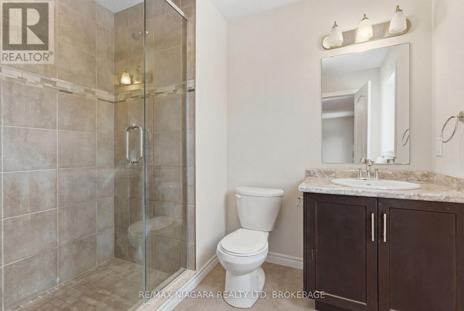 Primary bedroom 3pc ensuite w/ glass shower