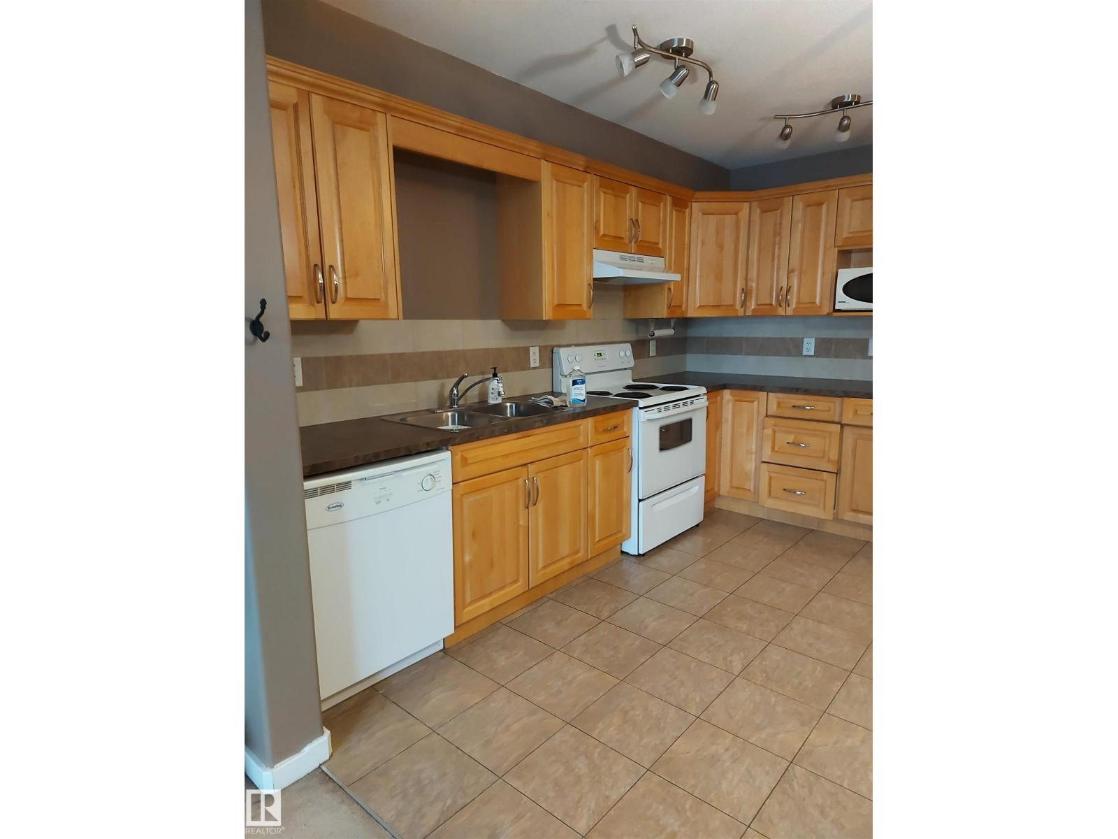 #203 11827 105 ST NW - 31