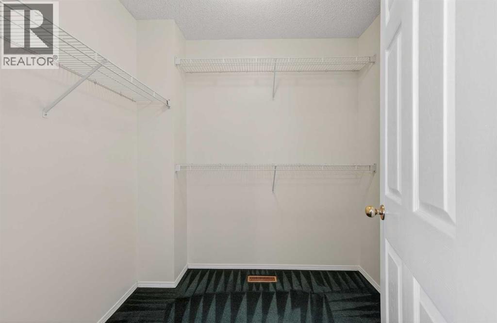 Single Family House 4 Level for Sale in  Hawkstone Manor NW Hawkwood Calgary 