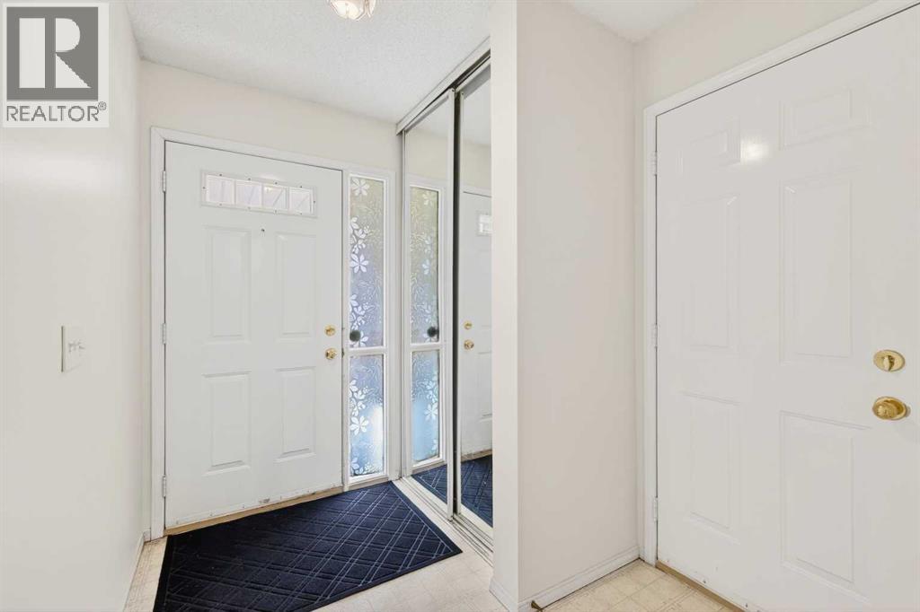 Single Family House 4 Level for Sale in  Hawkstone Manor NW Hawkwood Calgary 