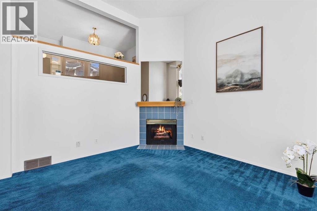 Single Family House 4 Level for Sale in  Hawkstone Manor NW Hawkwood Calgary 