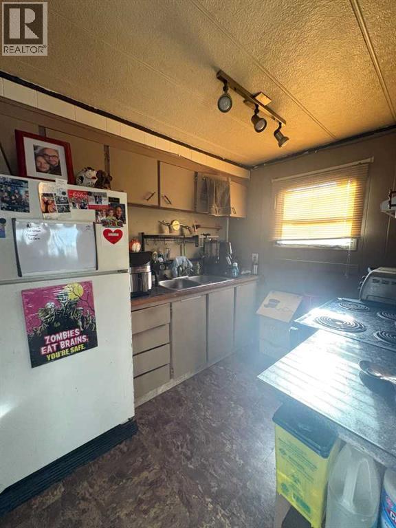 #34, 5311 60 STREET - 10