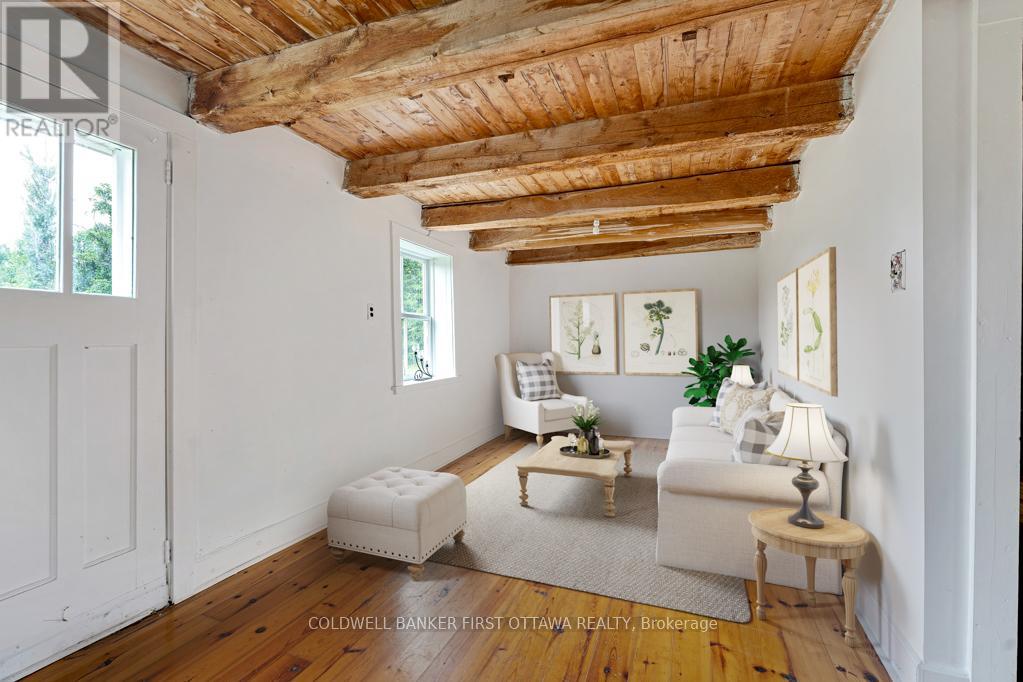 Main room living area - virtually staged