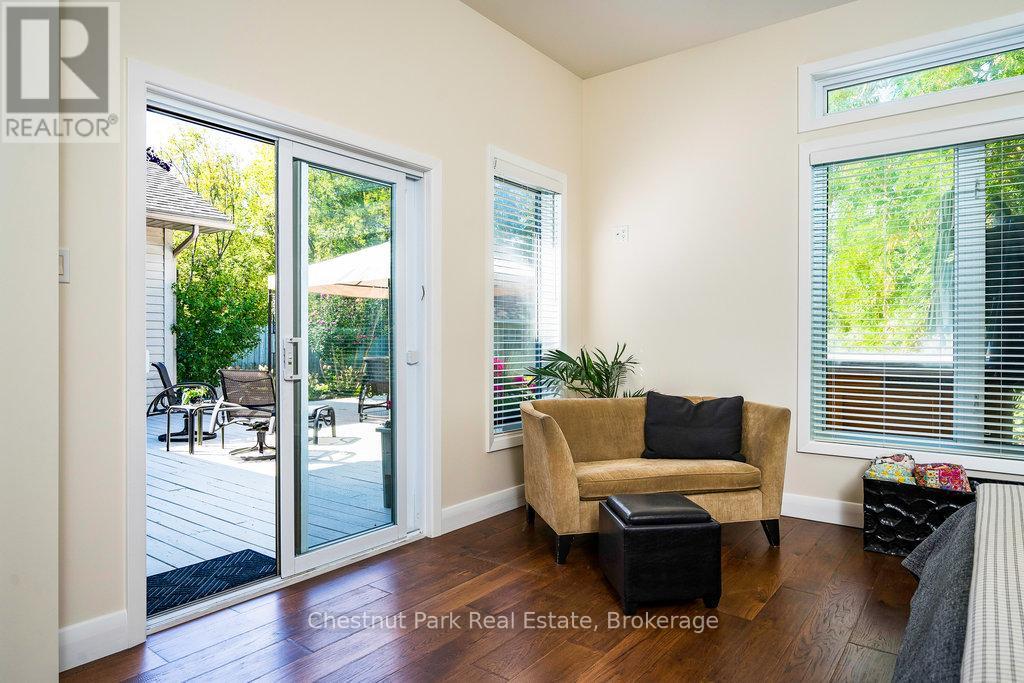 Walkout to deck & hot tub from primary bedroom