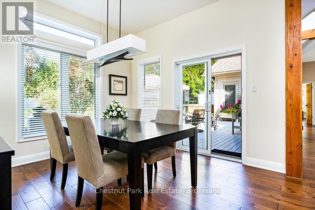 Dining room with walkout to back deck and yard