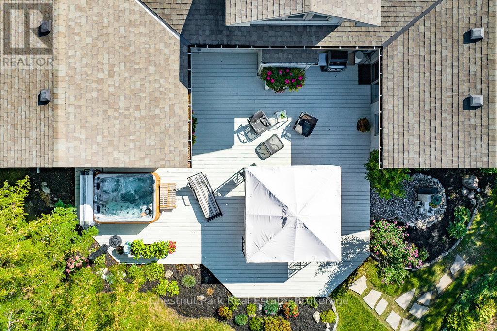Aerial view of the spacious deck and hot tub