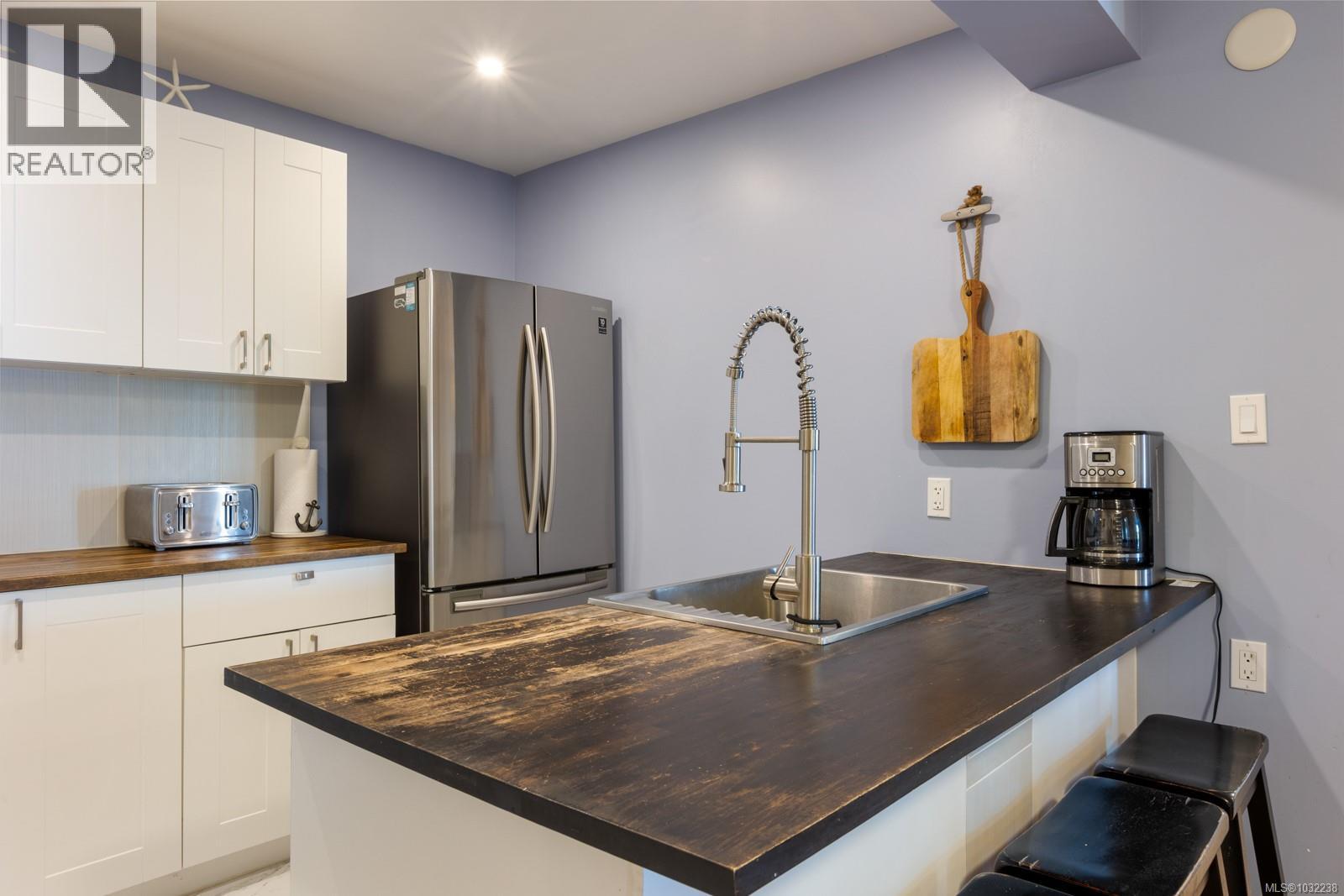 6800 BUCKLEY BAY FRONTAGE RD - 63