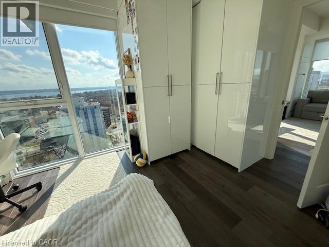 This room features expansive windows offering extensive views of the surrounding area and water