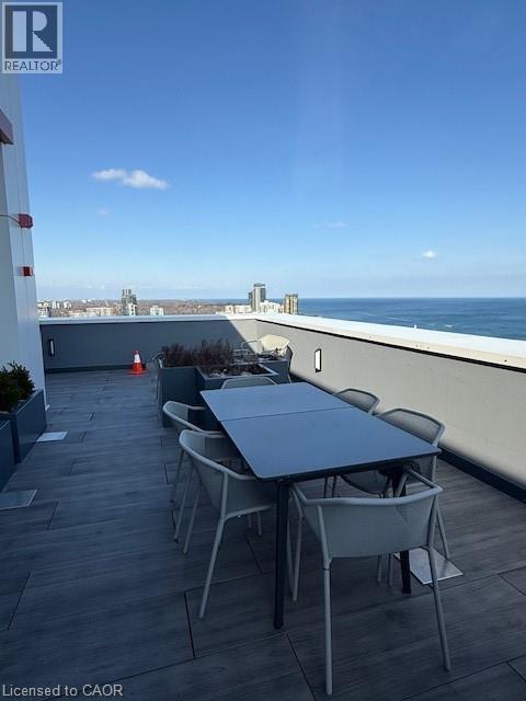Rooftop terrace with panoramic views of the ocean and cityscape