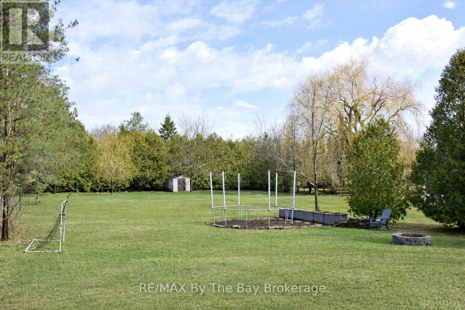 Large Back Yard with Lots of Trees for Privacy