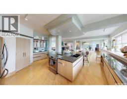 Laundry room - 400 1150 Rose Street, Regina, SK S4R1Z6 Photo 13