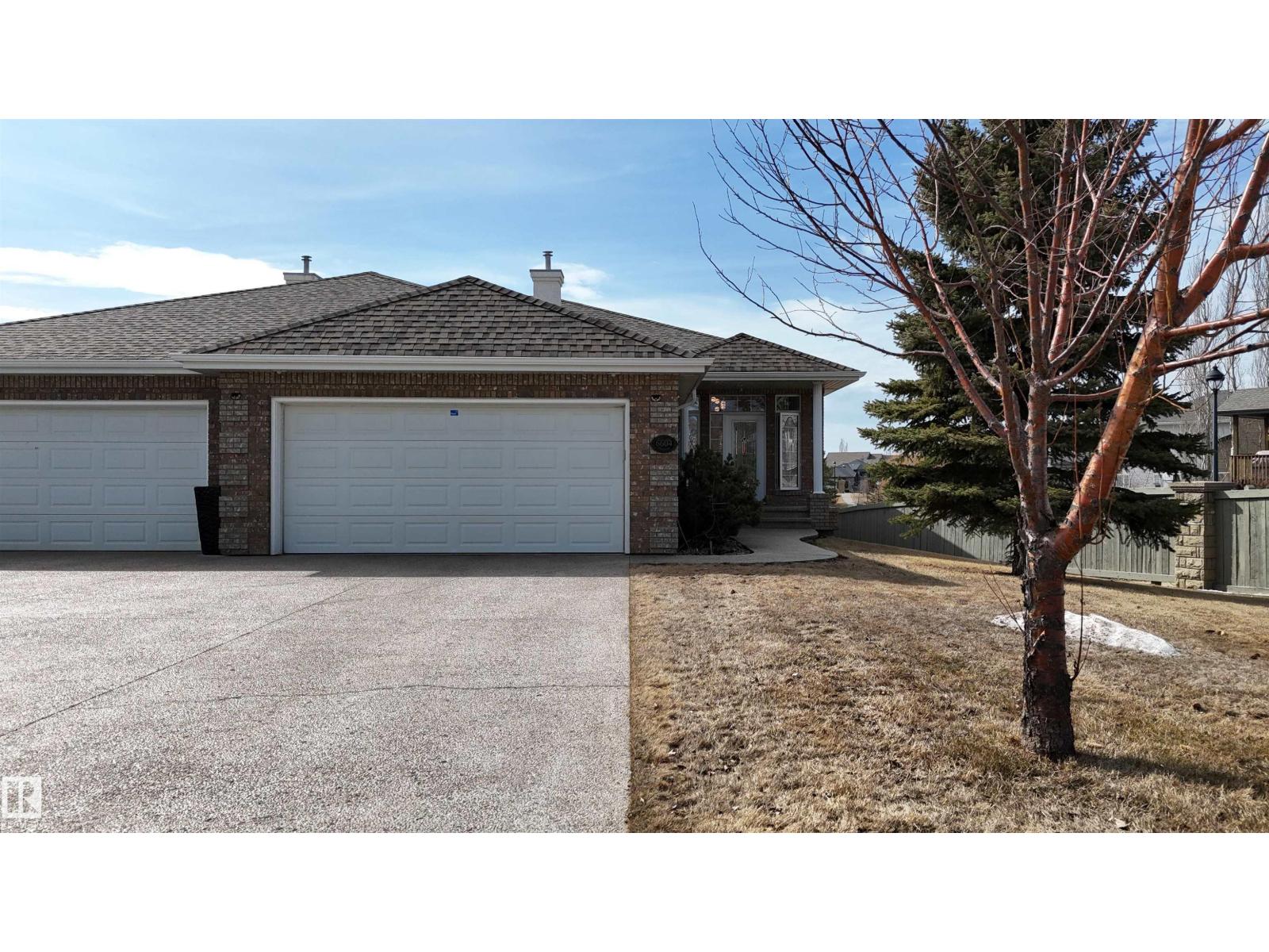 6604 SANDIN CV NW - 2