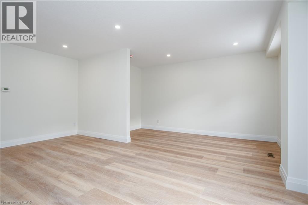 Spare room with recessed lighting and light wood finished floors