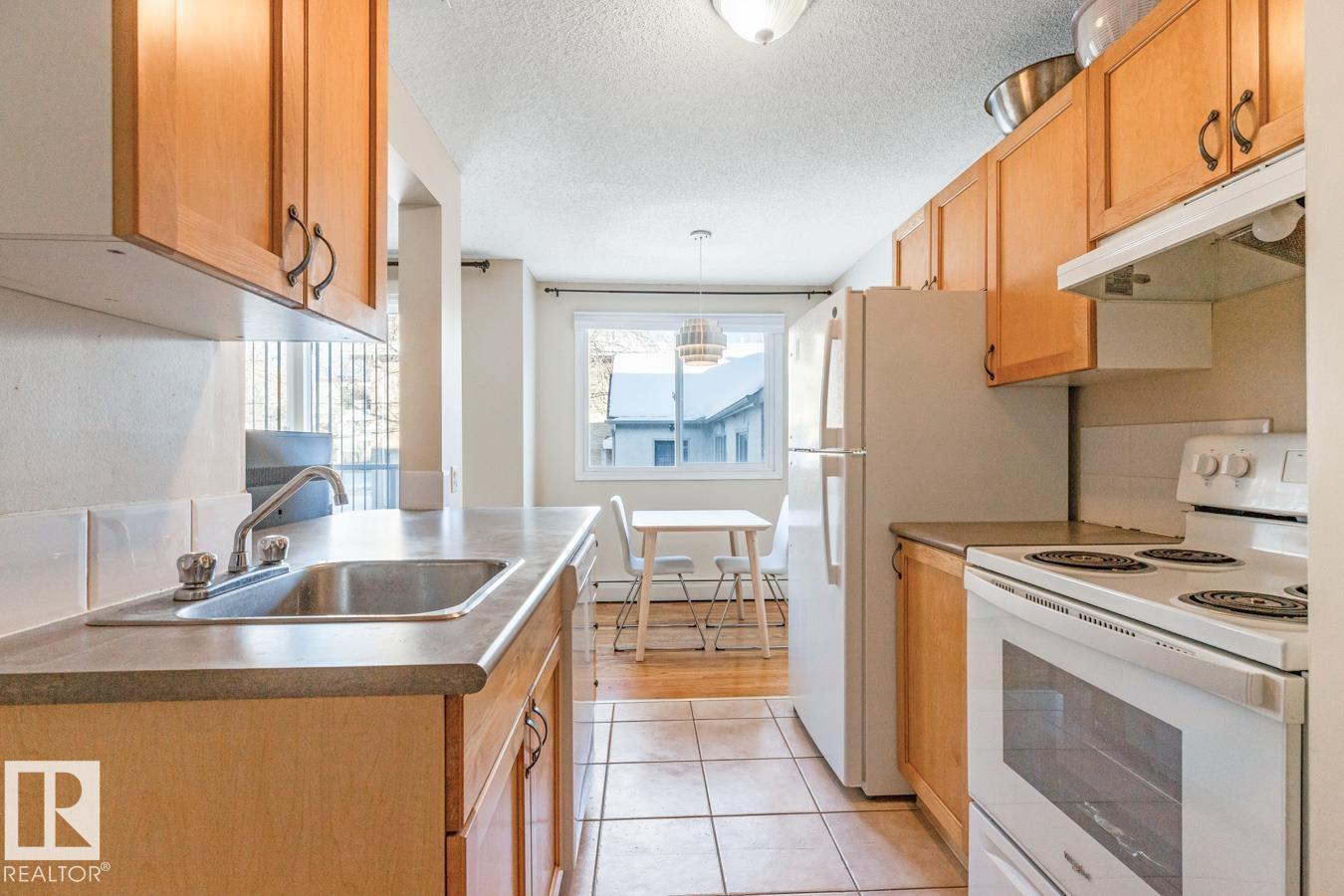 #203 10230 120 ST NW - 5