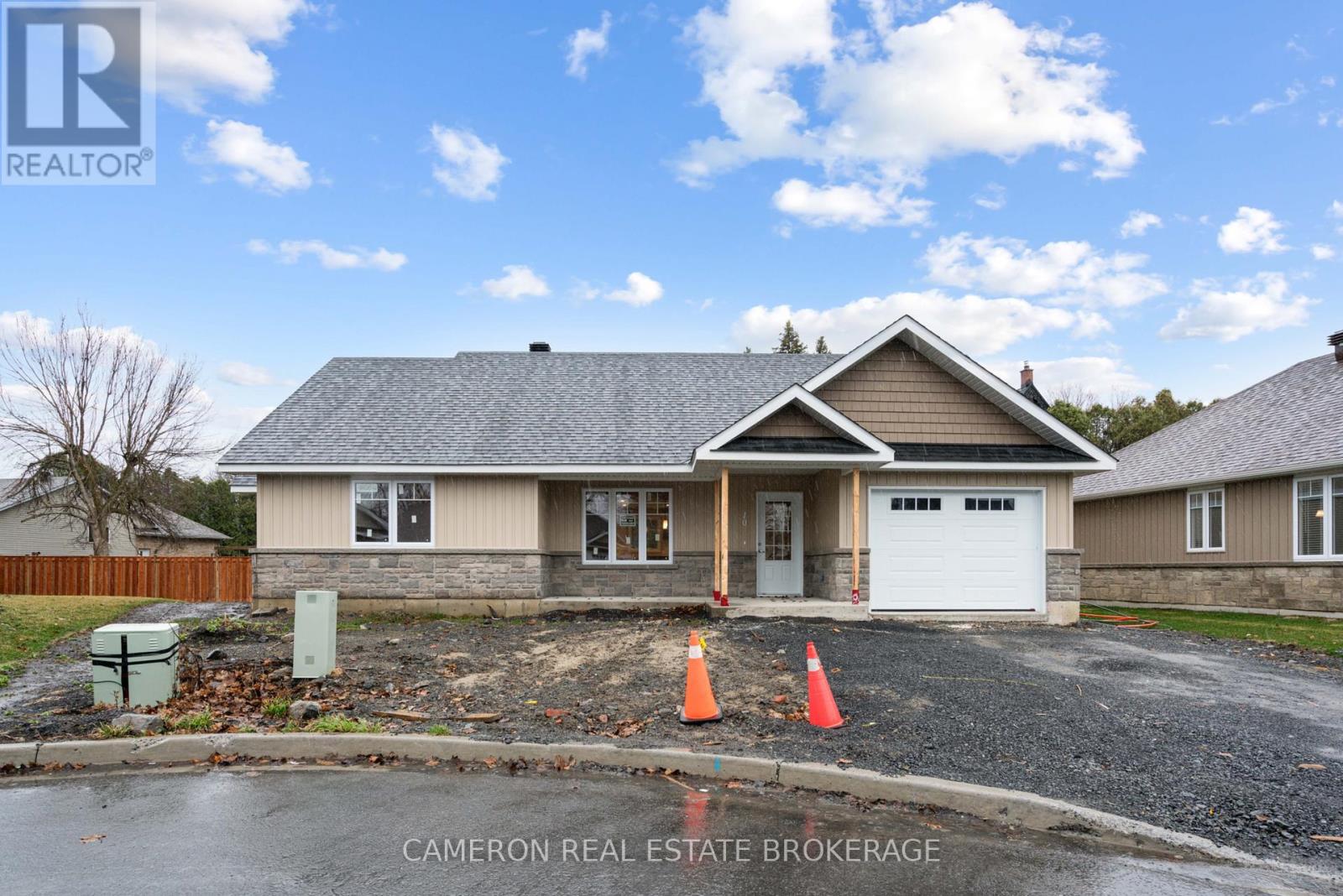 Actual photo, sod and driveway to be completed