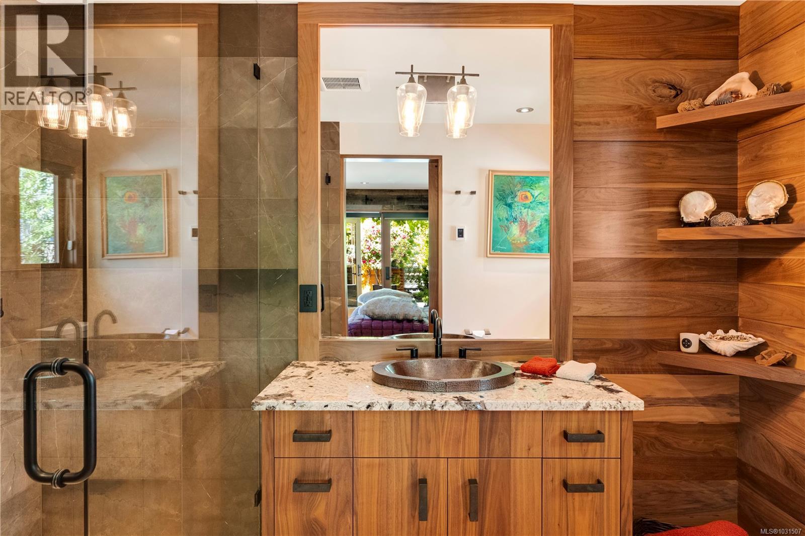 The guest quarters comfortably houses a family member or serves as the perfect artist's studio.