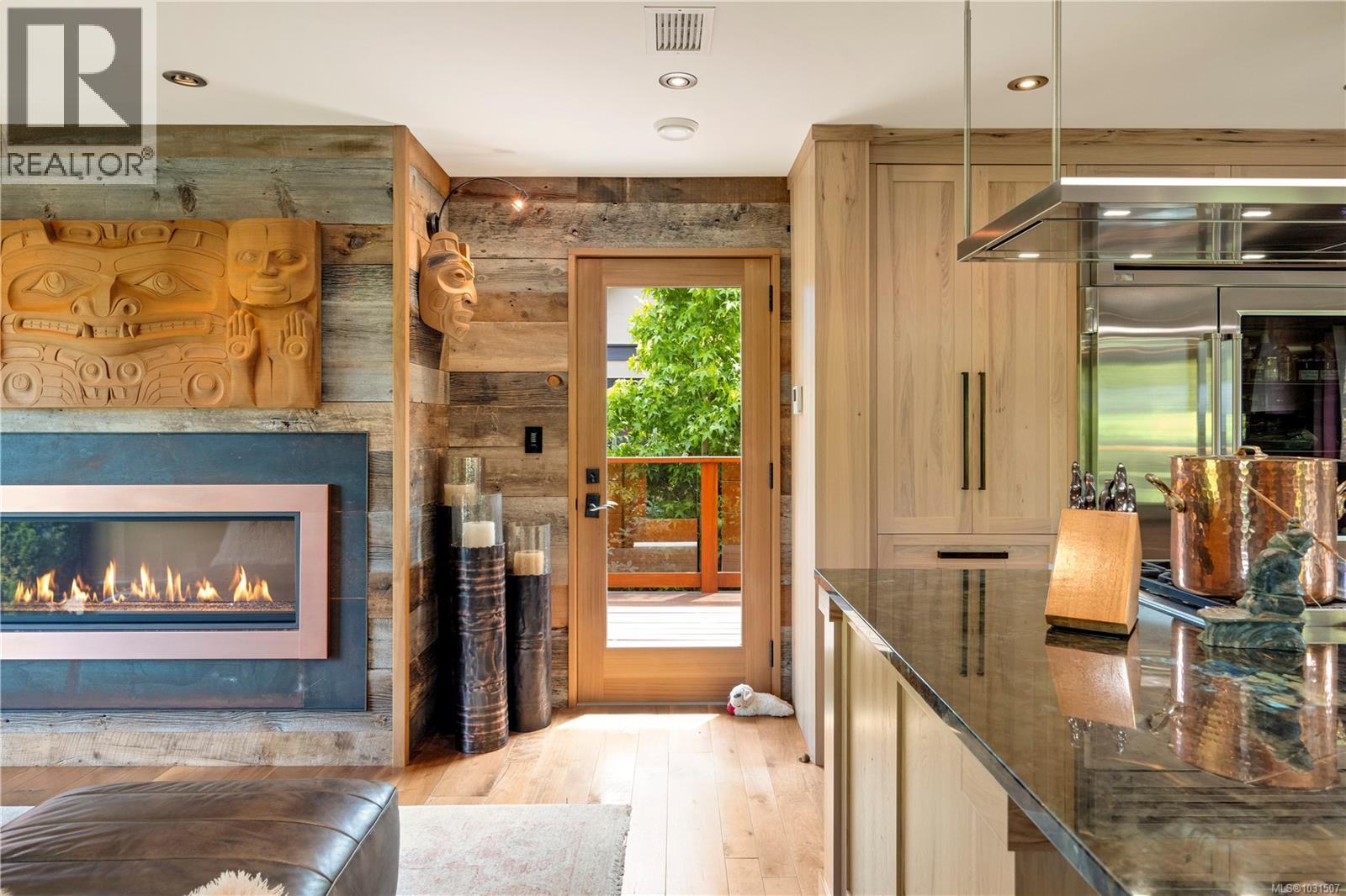 Solid Cedar Door that leads to a side deck.