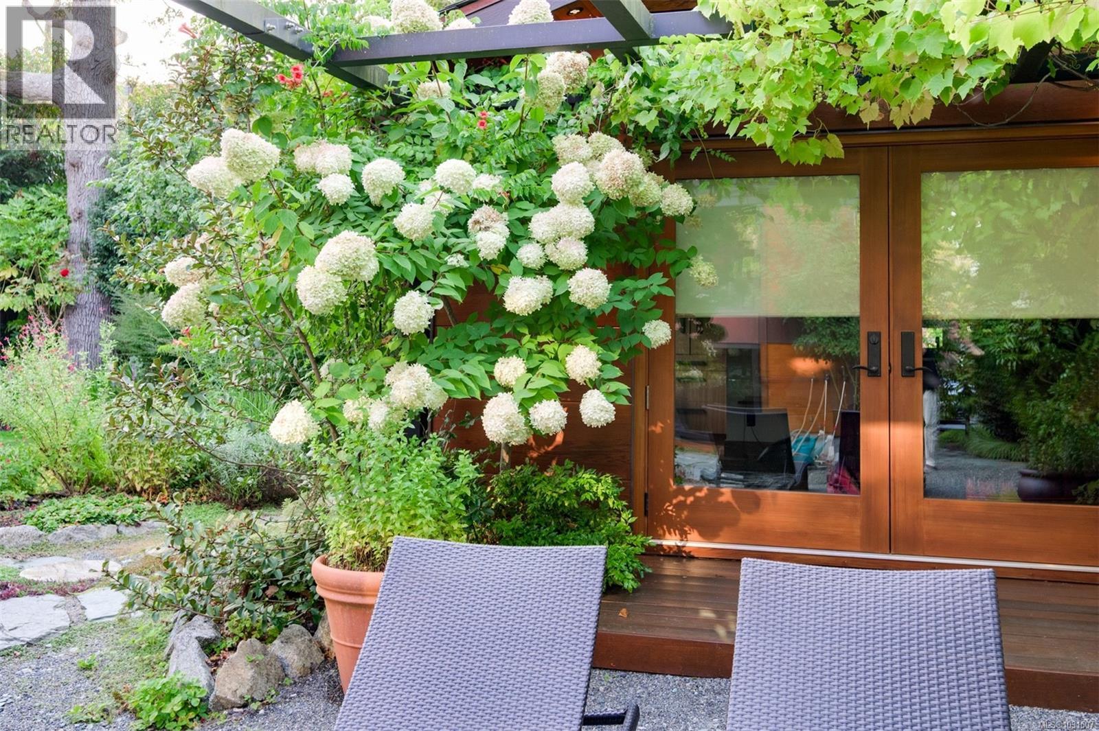 Guest Quarters ~ Oversized solid cedar French doors.