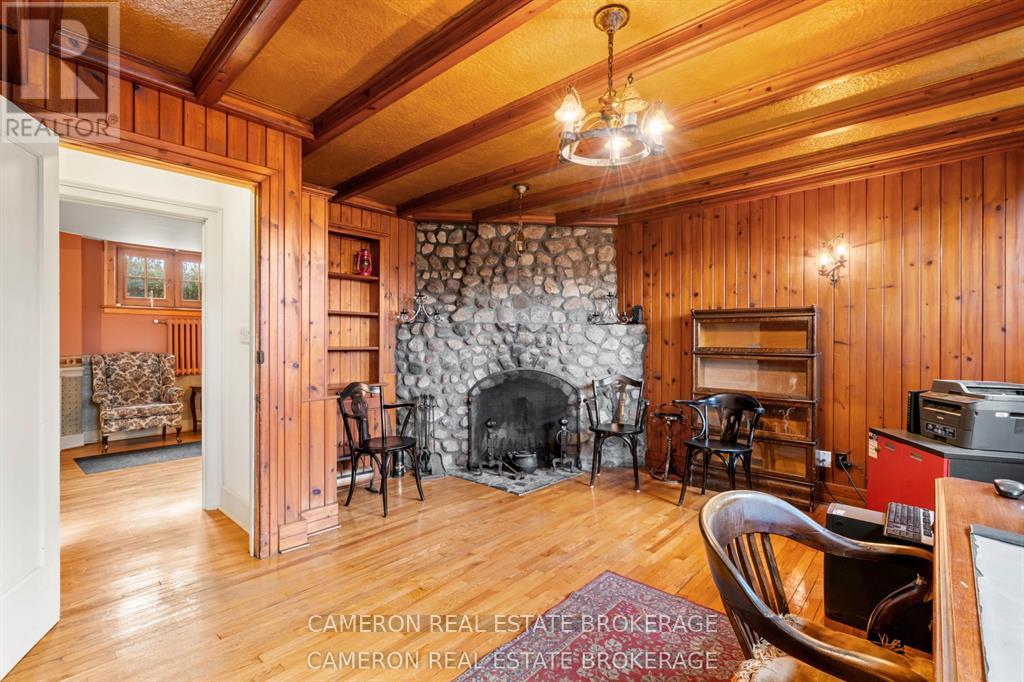 Home office with stone fireplace