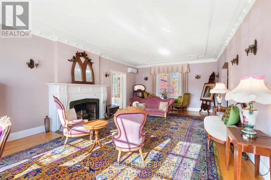 Spacious formal living room with fireplace