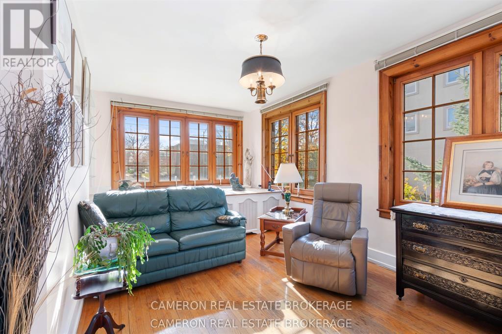 Spectacular sunroom/sitting room on main floor