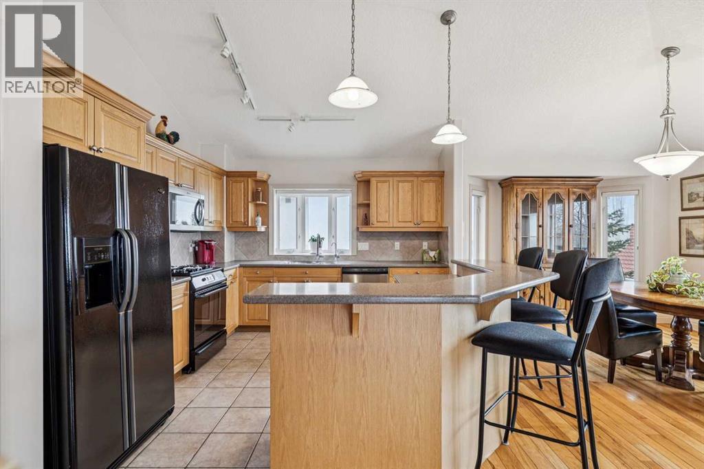 Single Family House 4 Level for Sale in   Signature Way SW Signal Hill Calgary 