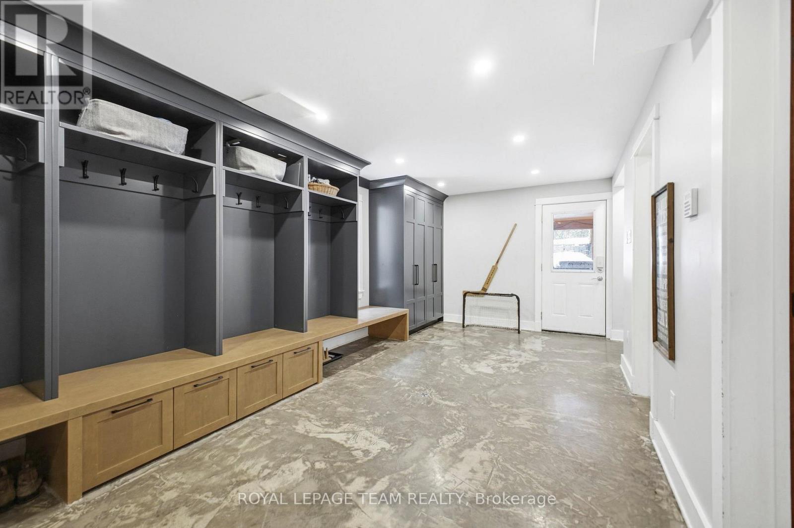 Mudroom with walk-out to covered hot tub