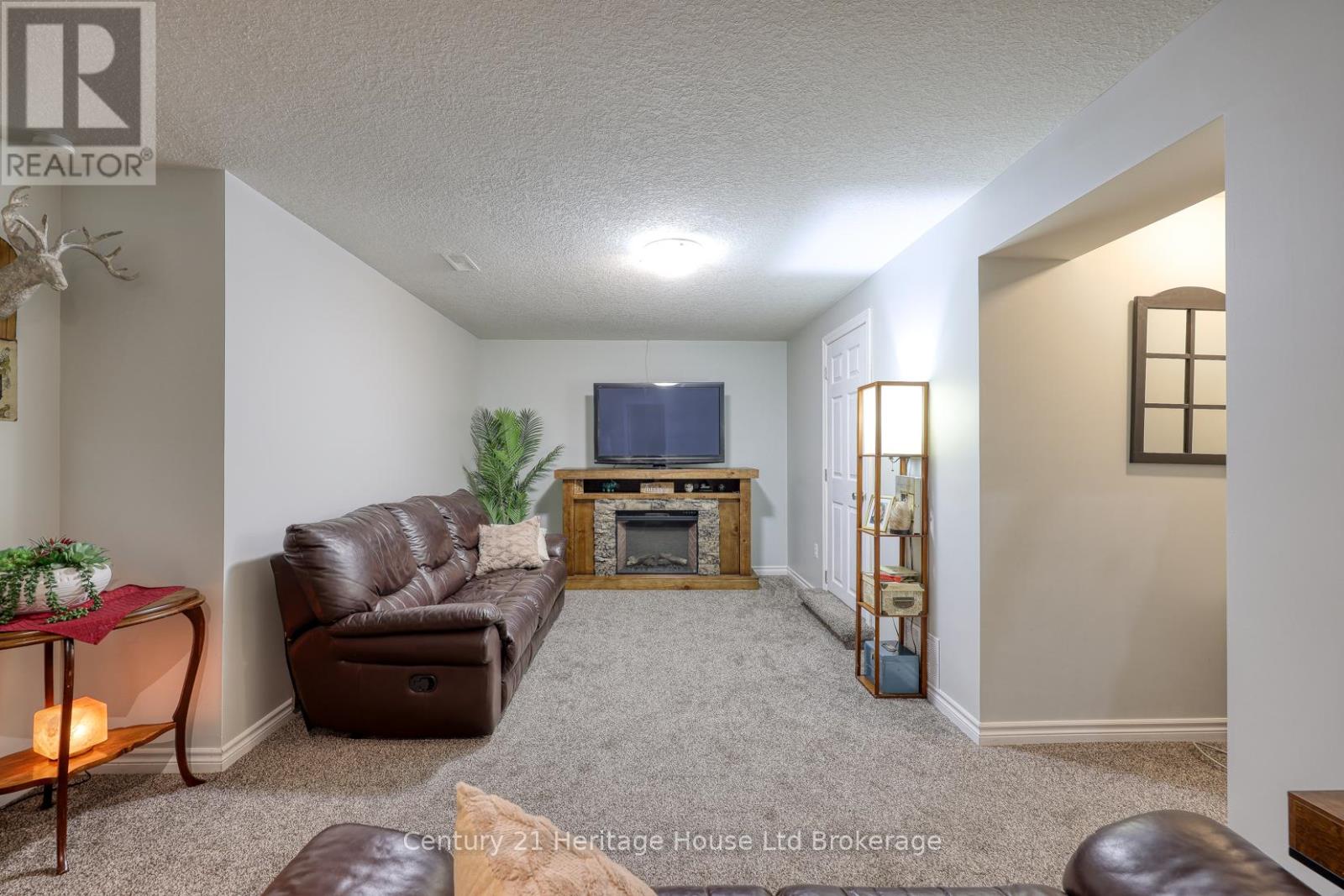 FAMILY ROOM - LOWER LEVEL -DOOR TO LOWER LVL FOYER