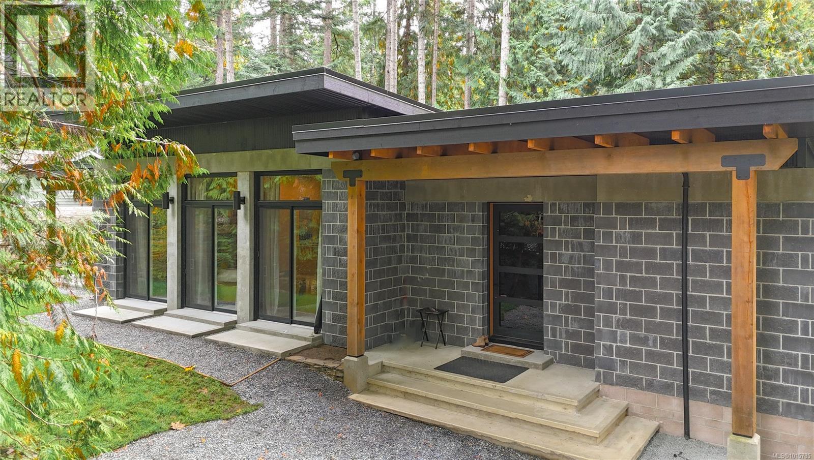 Custom designed 2-bed/2-bath fully engineered masonry-built home!