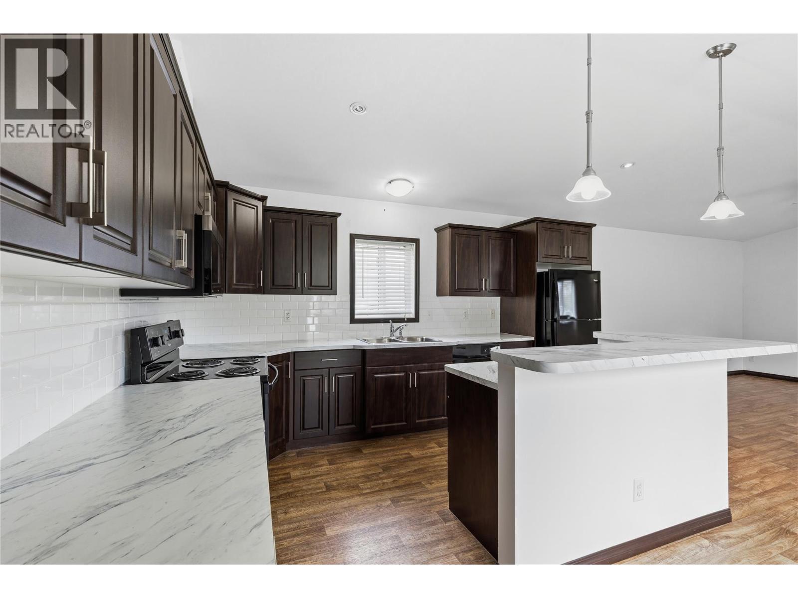 #202 15401 KALAMALKA ROAD - 13