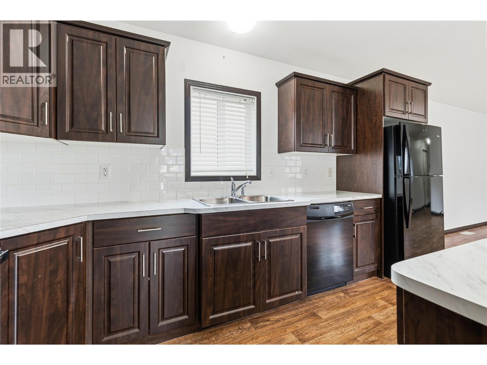 #202 15401 KALAMALKA ROAD - 30