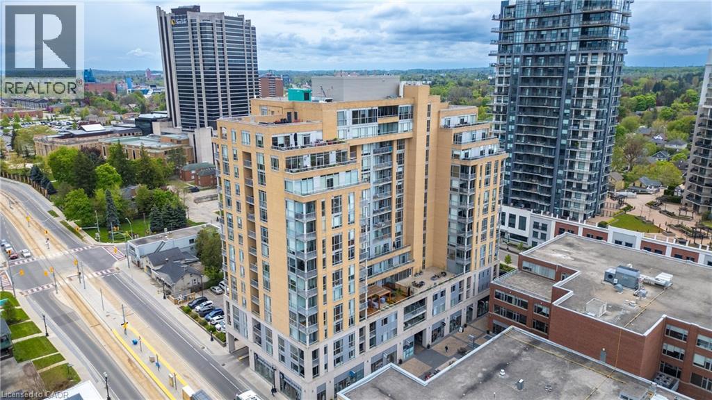 View of building exterior featuring a city view
