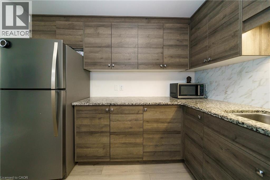261 WOODBINE Avenue Unit# 48, Kitchener, Ontario, N2R0S7 — Photo 17