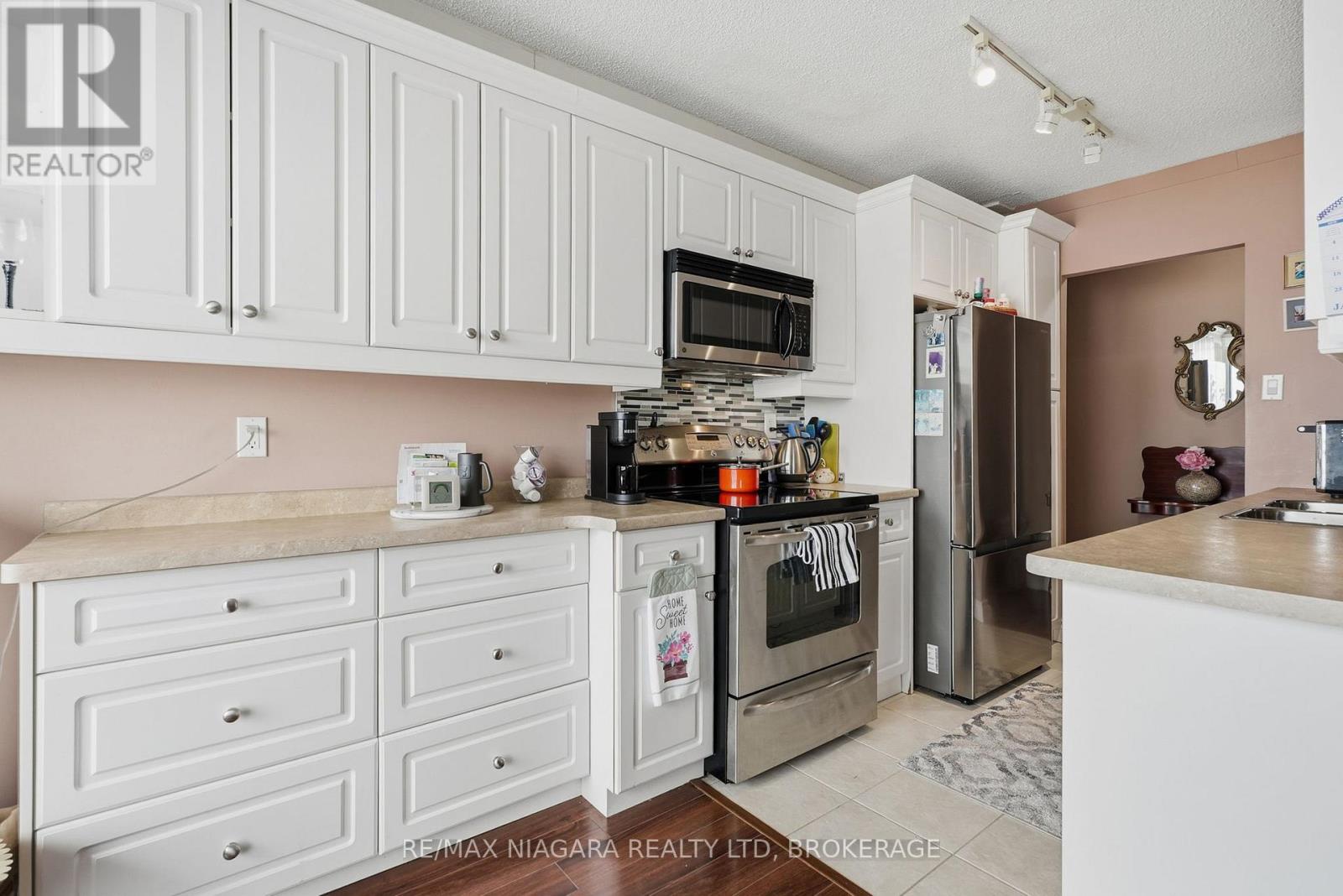 601 - 6390 HUGGINS STREET — photo 12