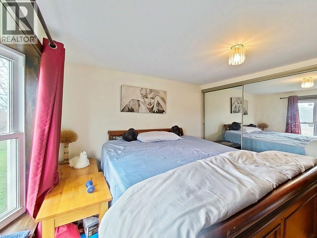 The property features a room with a large window, providing views of the outdoors