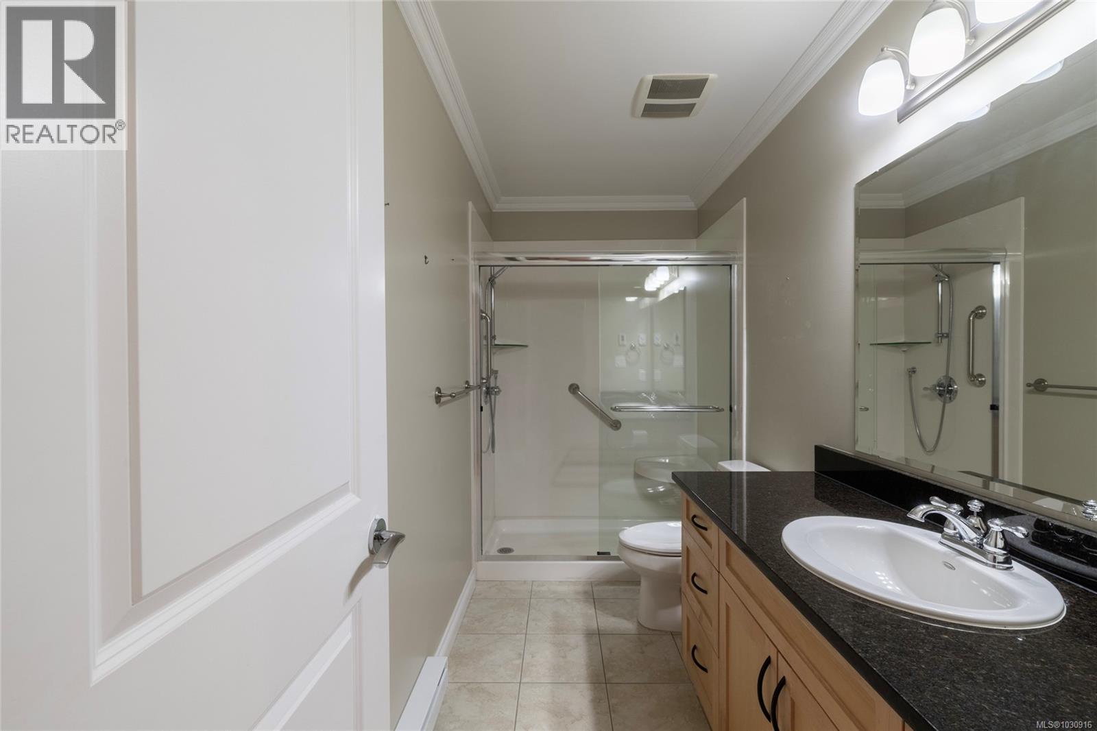 201 9942 Third Street, Sidney