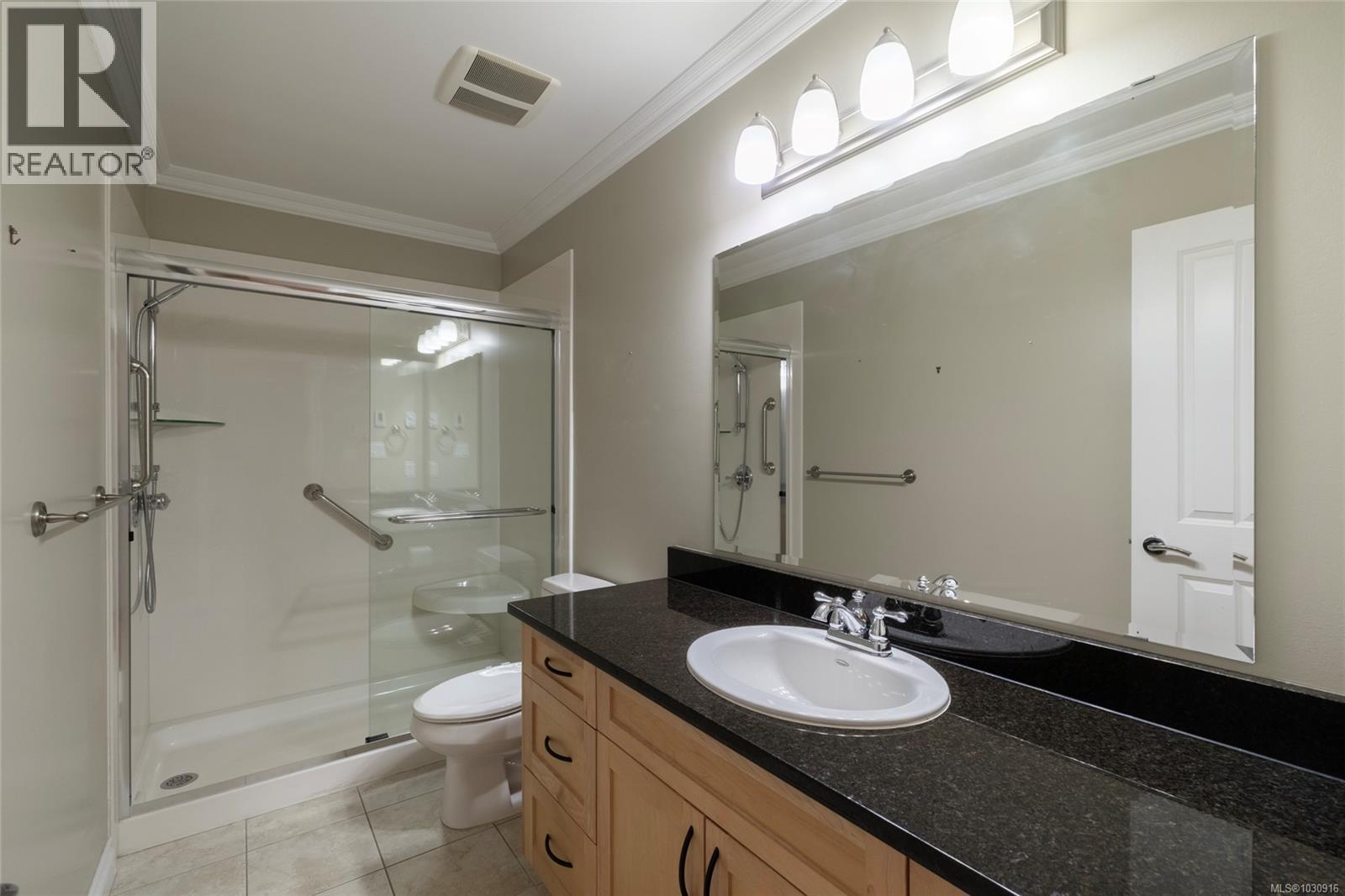 201 9942 Third Street, Sidney