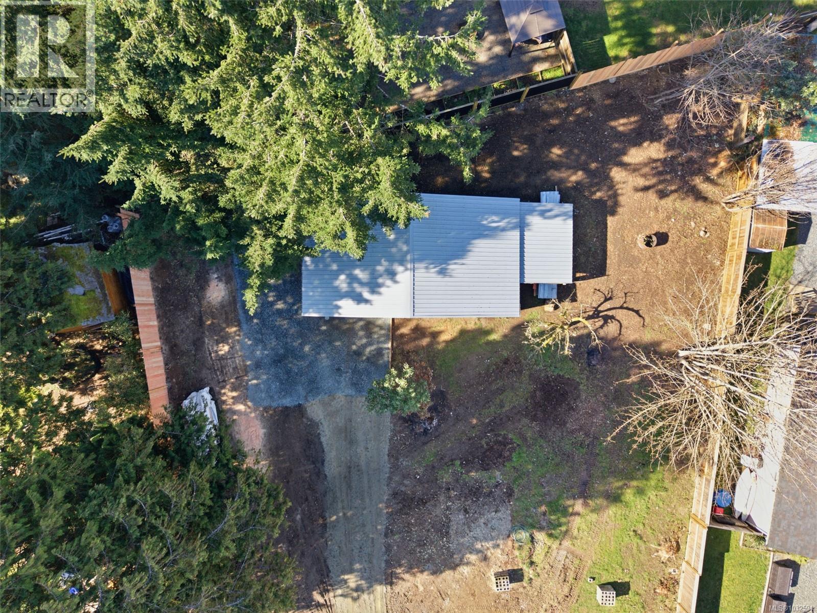 View from above of shop with metal roof