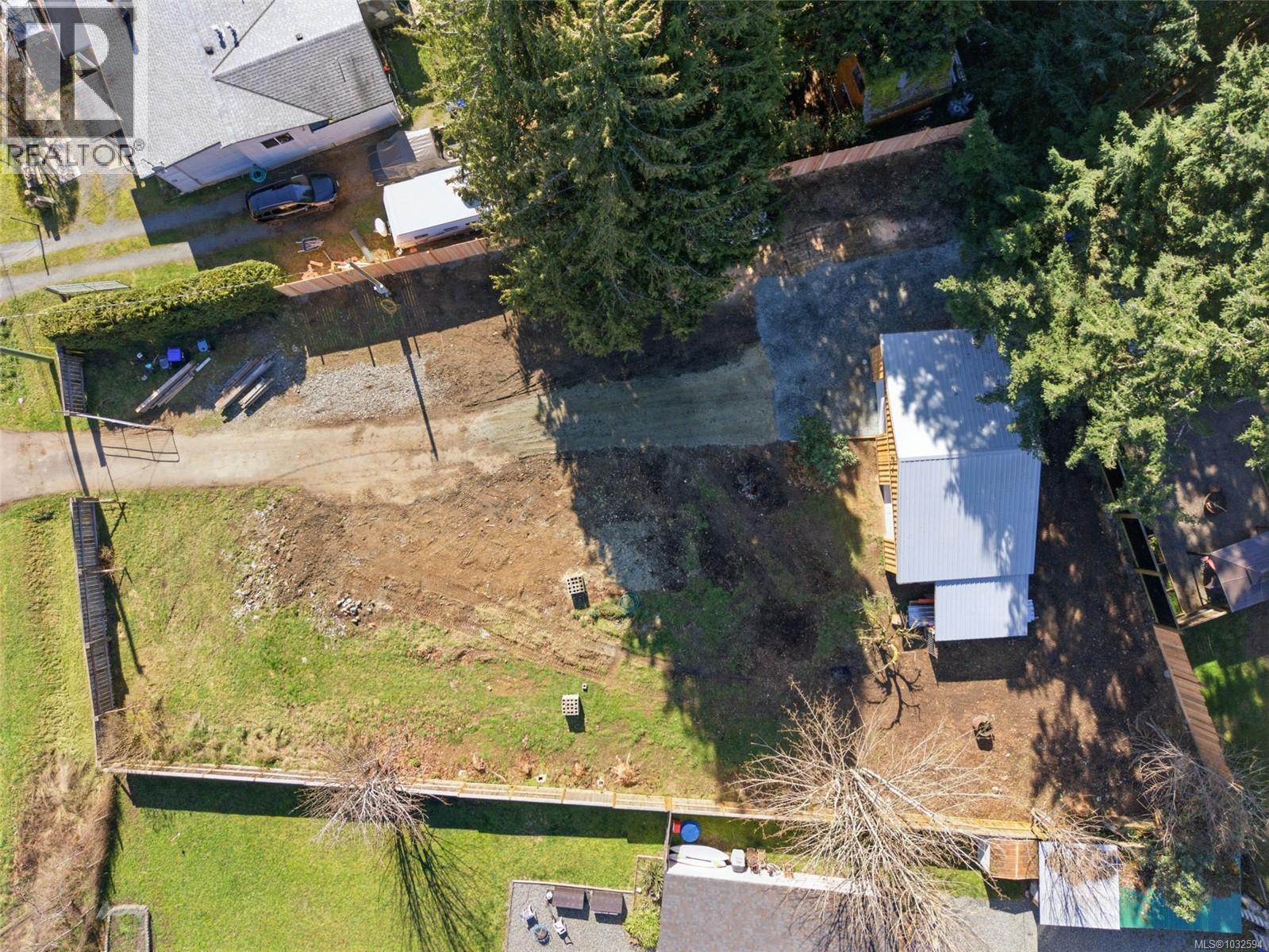 Driveway and lots of areas for flat parking and building