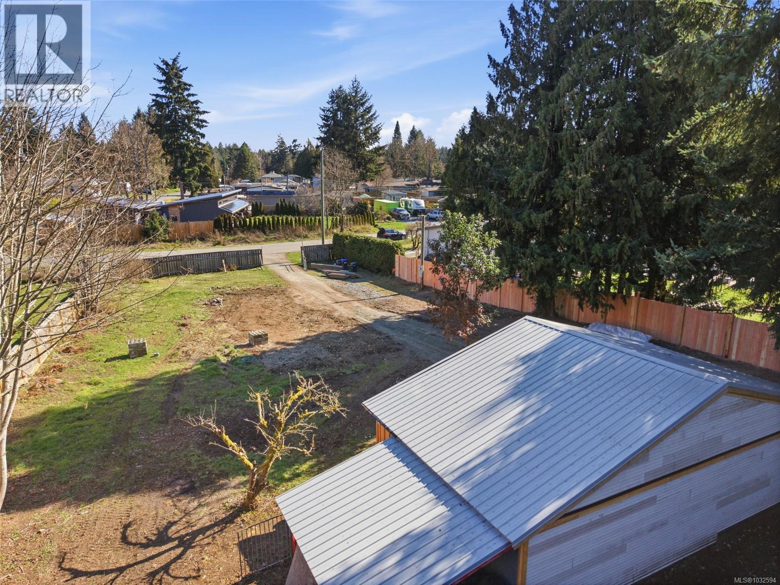 Driveway and lots of areas for flat parking and building