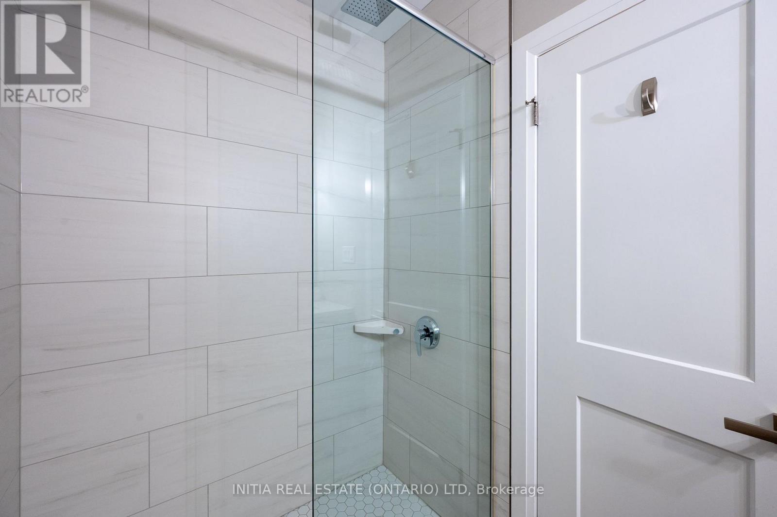Main bathroom walk in glass shower
