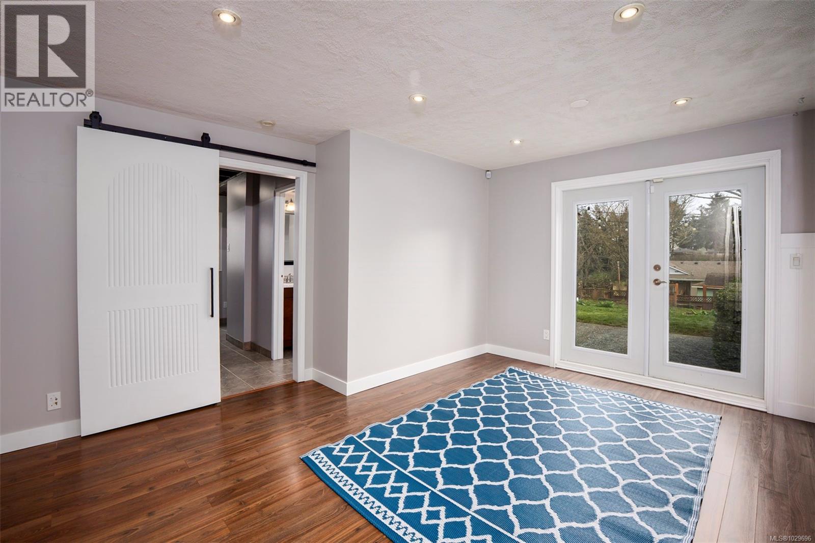 Spacious family room with French doors to patio and Gazebo