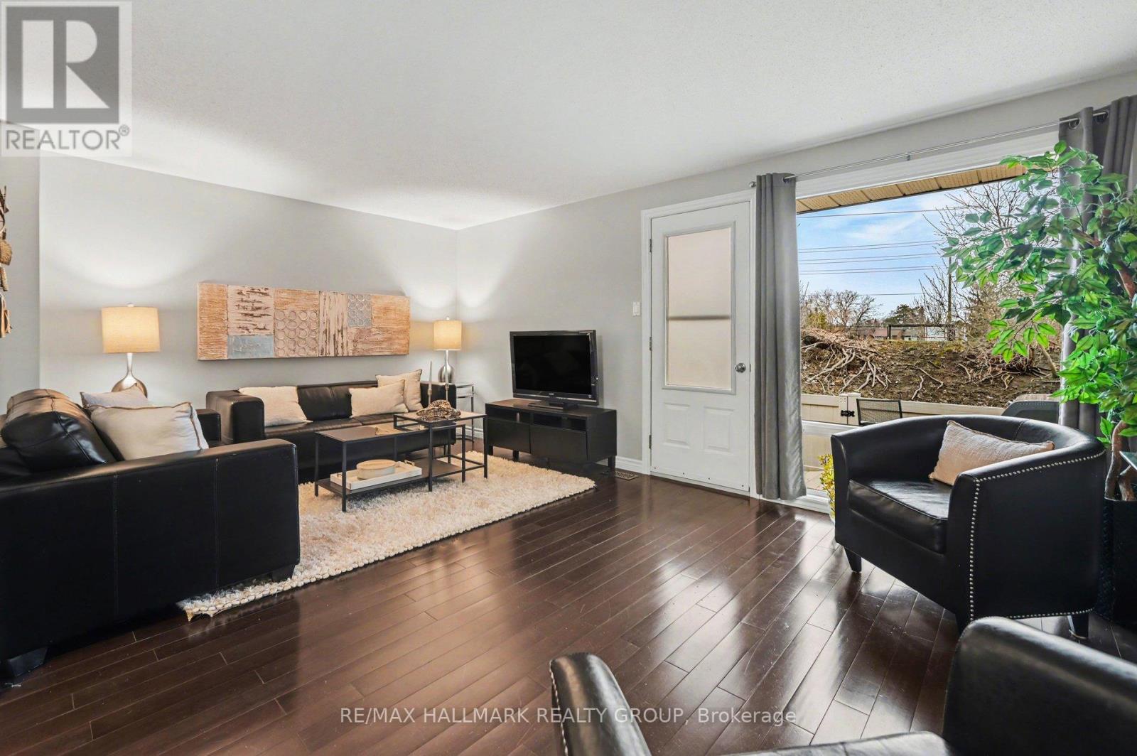 Spacious Living Room with access to rear yard.