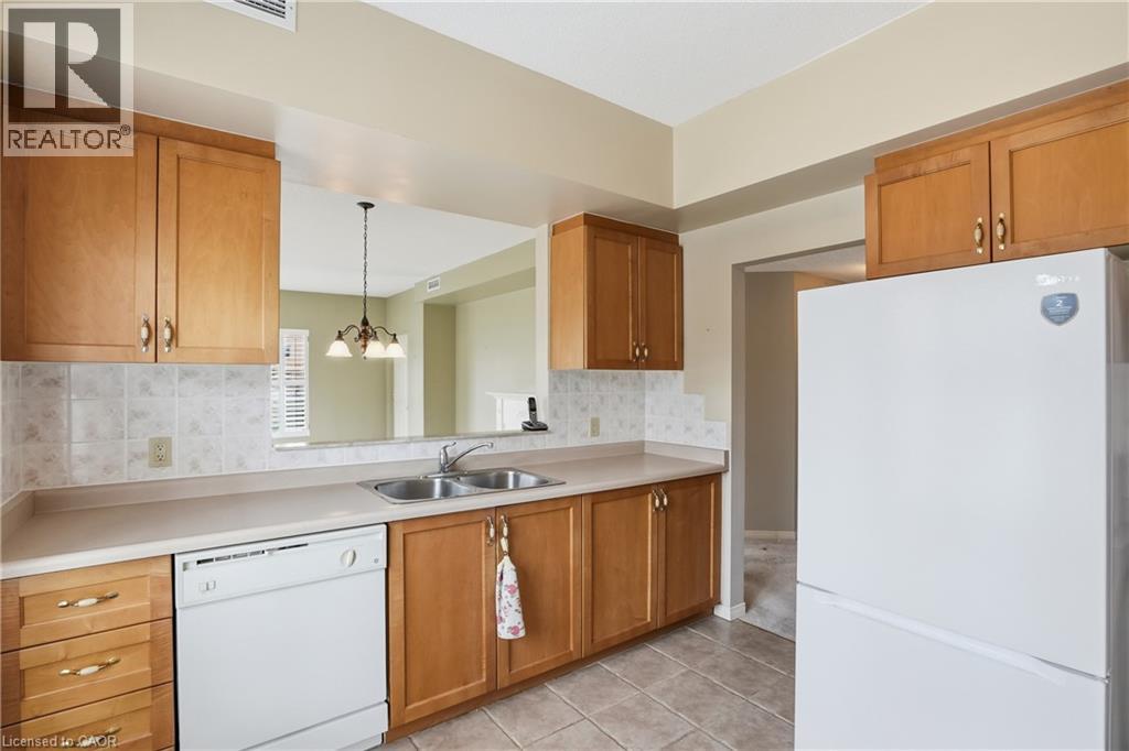3497 UPPER MIDDLE Road Unit# 108 — photo 16