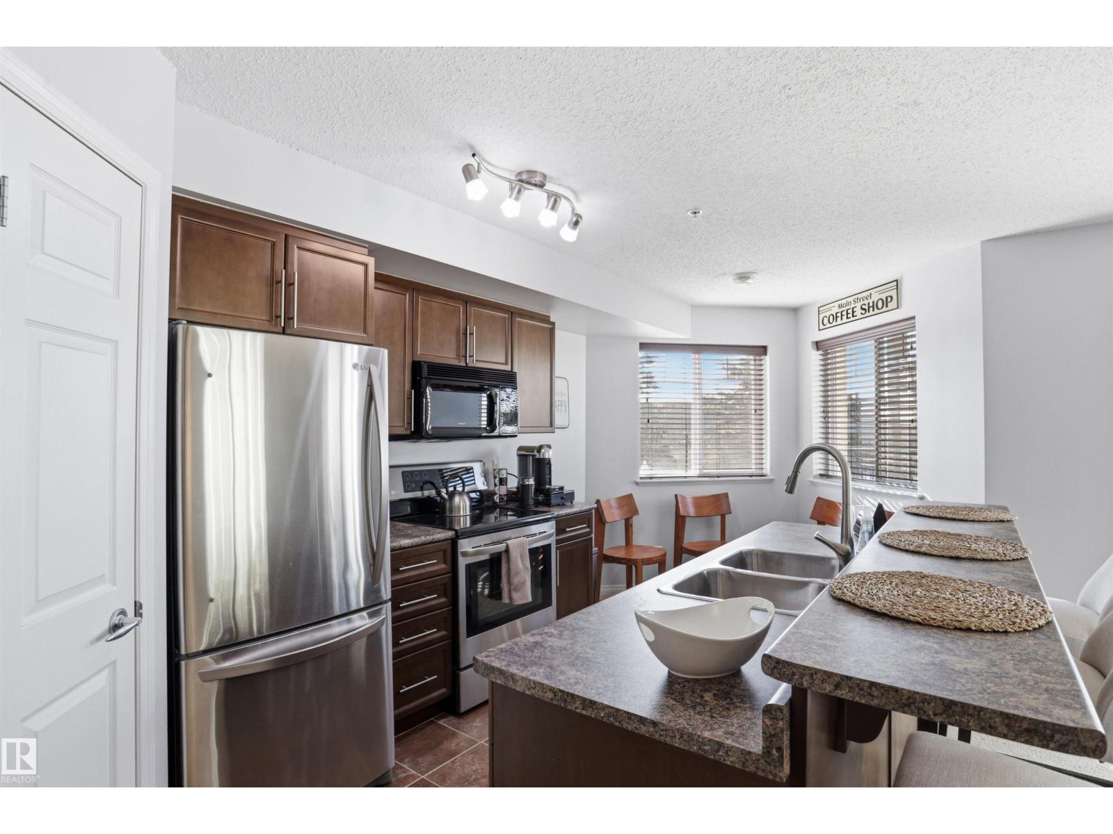 #115 6925 199 ST NW - 8