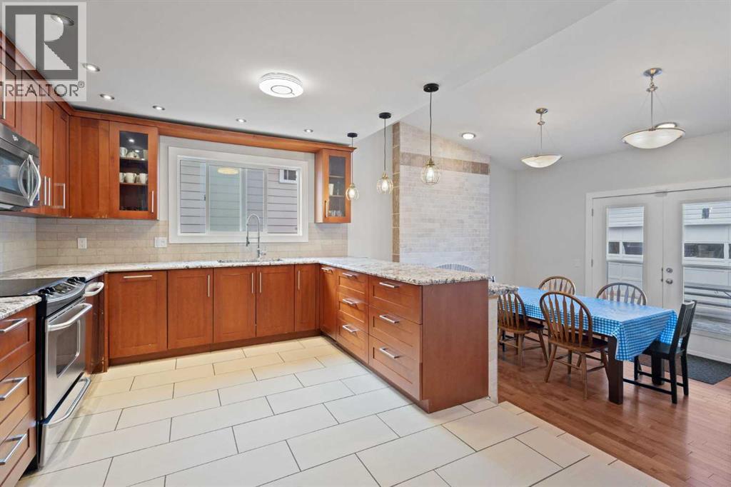 208 Woodpark Place SW Photo 11 - Calgary Real Estate