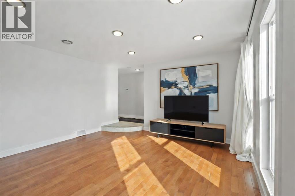 208 Woodpark Place SW Photo 2 - Calgary Real Estate