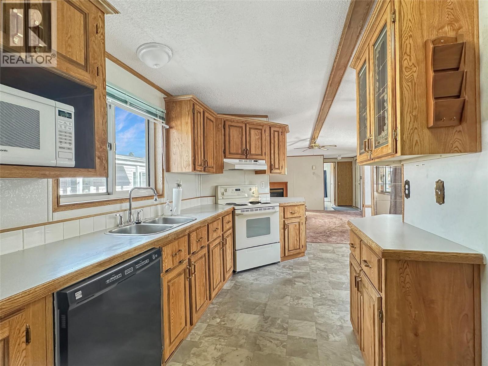 6778 TUCELNUIT Drive Unit# 46, Oliver