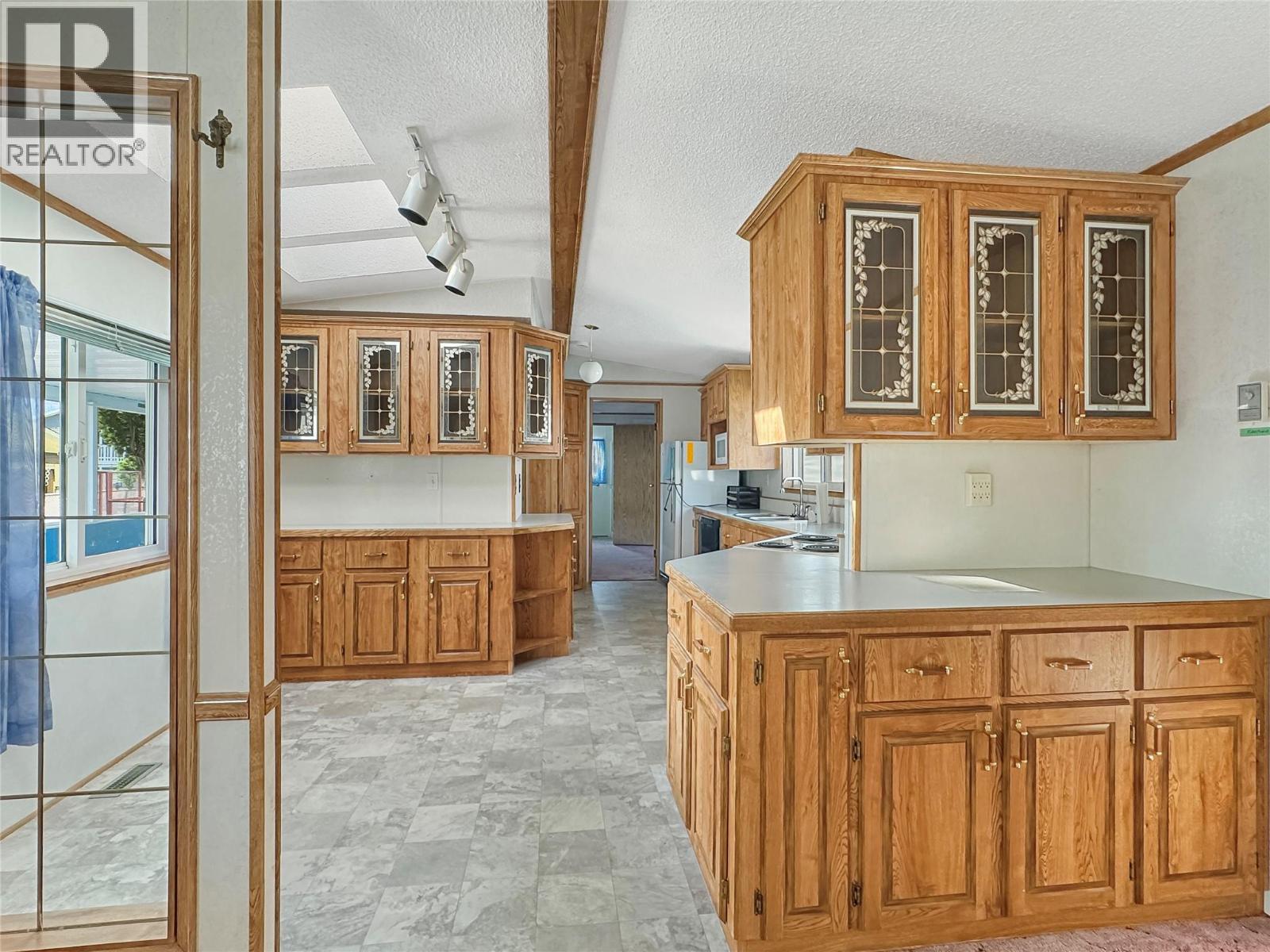 6778 TUCELNUIT Drive Unit# 46, Oliver